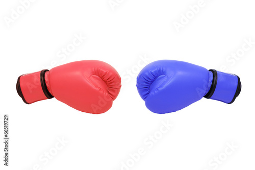 blue and red boxing gloves in white background © charnsitr