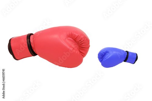 blue and red boxing gloves in white background © charnsitr
