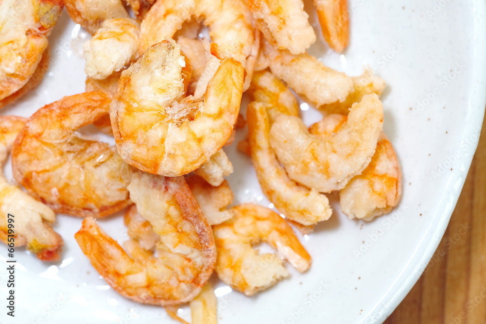 Uncooked food dried shrimp on plate Uncooked food dried shrimp on plate