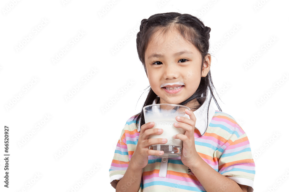 Asian little girl drinking milk Asian little girl drinking milk