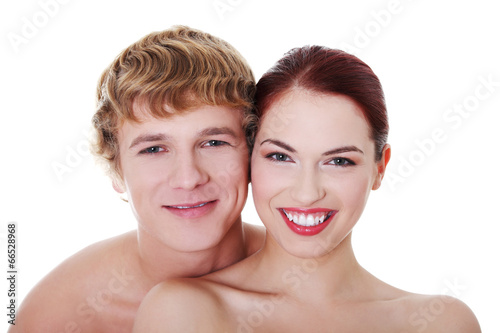 Topless couple standing