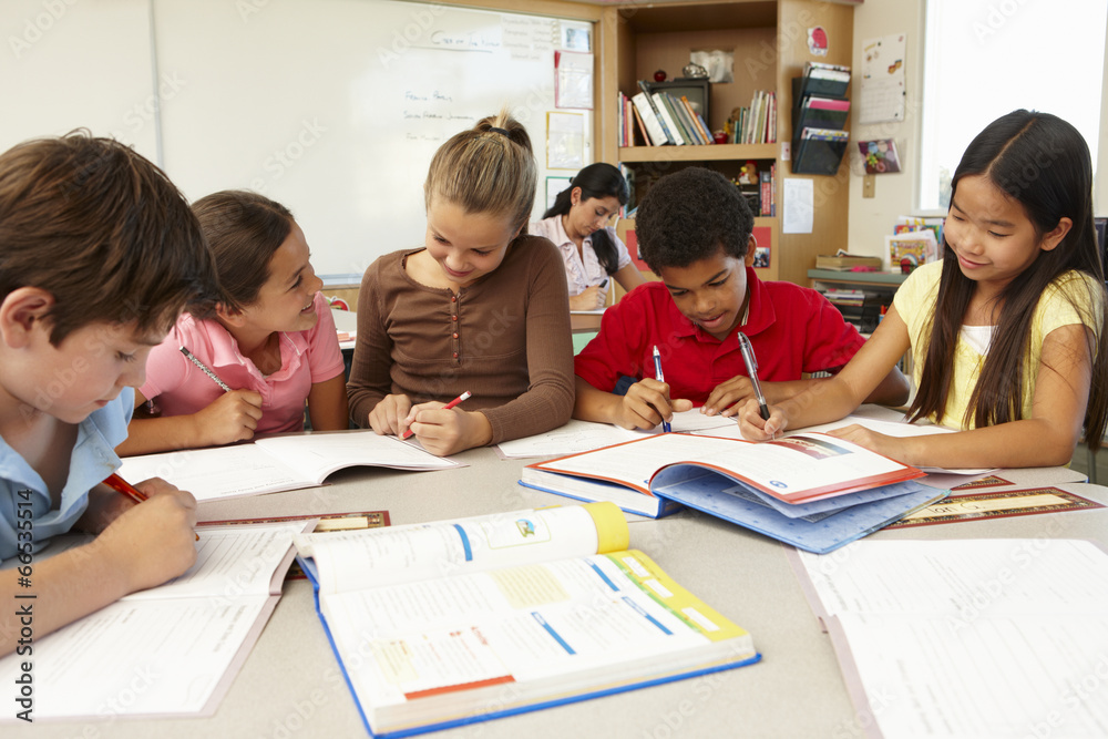 Teacher and schoolchildren in class Teacher and schoolchildren in class