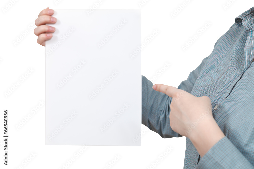 forefinger points on blank paper in female hand forefinger points on blank paper in female hand