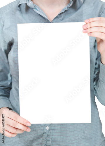 white sheet of paper in female hands