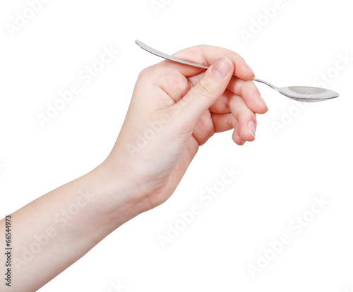 Quadro su tela empty teaspoon in hand isolated on white