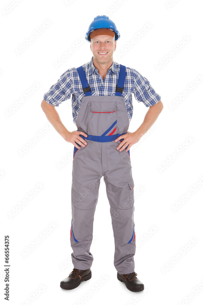 Manual Worker Standing With Hands On Hip