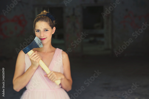Cute serial killer holding an axe