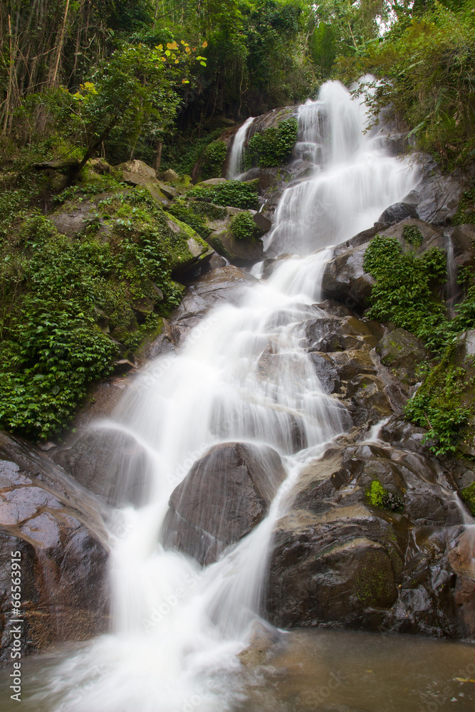 Waterfall in mountain jungle near Chiang Rai Waterfall in mountain jungle near Chiang Rai
