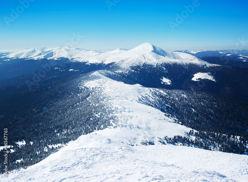 Mountain valley in the winter time. Beautiful winter landscape © biletskiyevgeniy.com