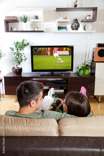 Couple watching sport