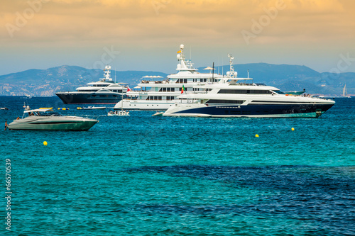 Luxury yachts in turquoise beach of Formentera Illetes © Lukasz Janyst