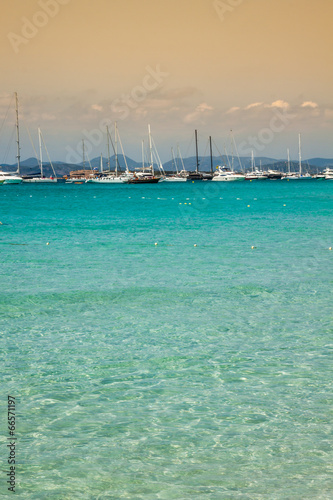 Obraz na płótnie Luxury yachts in turquoise beach of Formentera Illetes w salonie