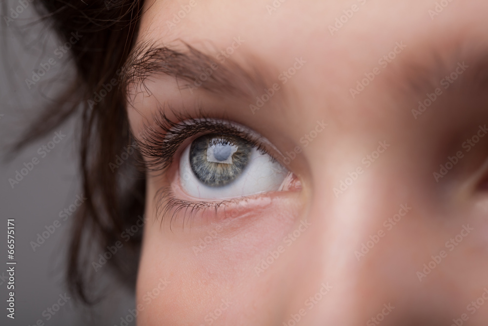 Fototapeta premium Portrait of a pretty girl close up eye