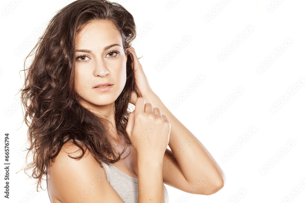 Beautiful woman posing on white background Beautiful woman posing on white background