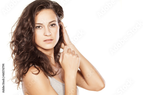 Beautiful woman posing on white background