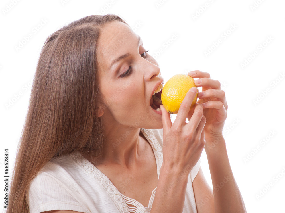 young woman holding a lemon