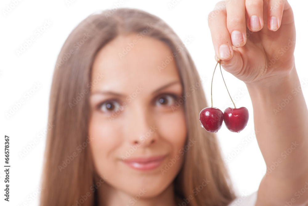 hand holding two fresh cherries hand holding two fresh cherries