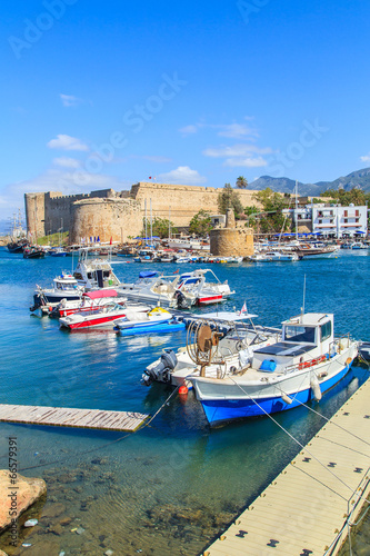 Boats in a port of Kyrenia (Girne) a castle in the back, Cyprus