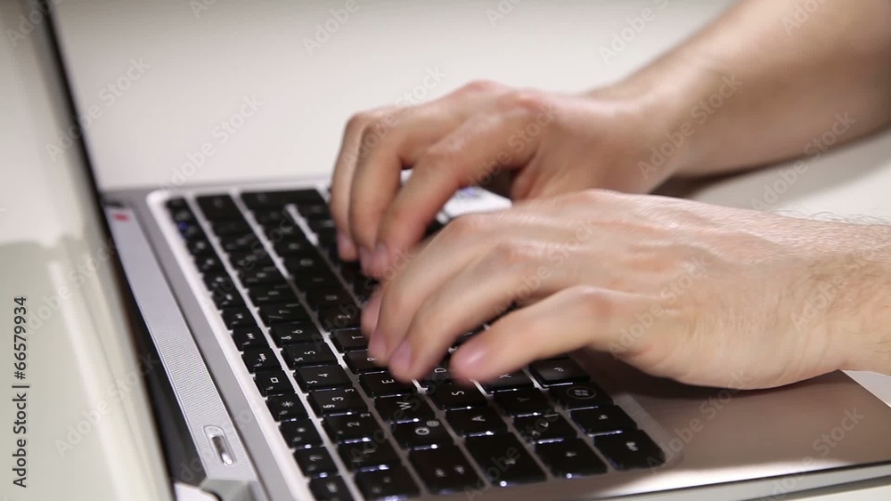 Typing on laptop Typing on laptop