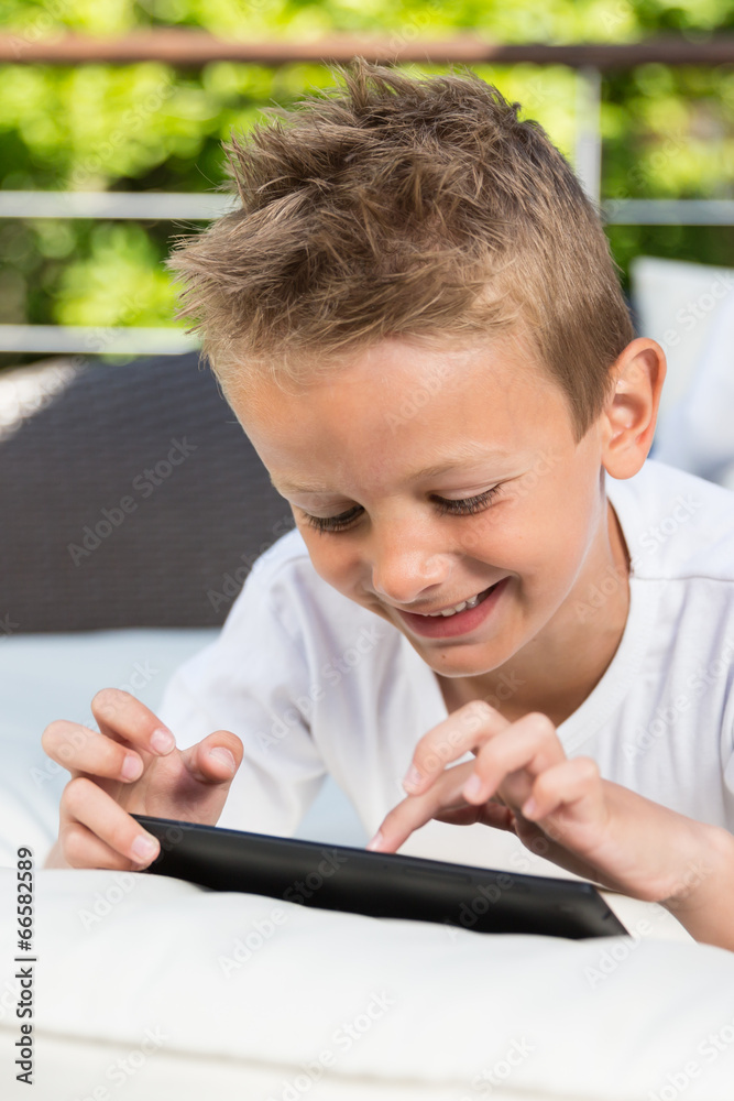 Close-up of boy with tablet Close-up of boy with tablet