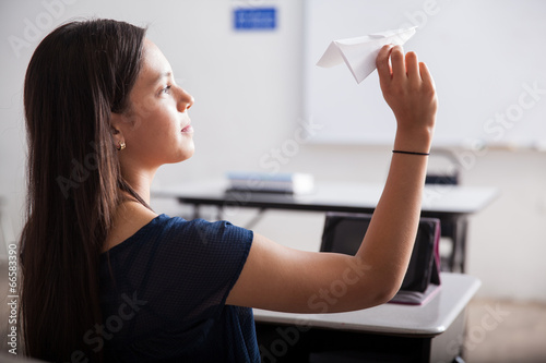 Fotografie Flying paper planes in detention