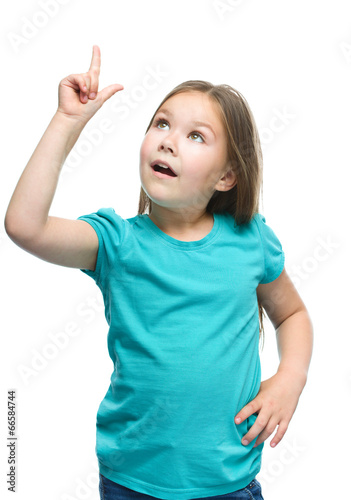 Cute girl is holding her face in astonishment