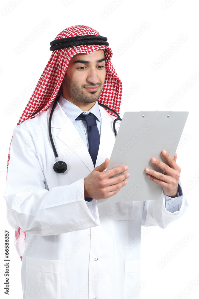 Arab saudi doctor reading a medical history Arab saudi doctor reading a medical history