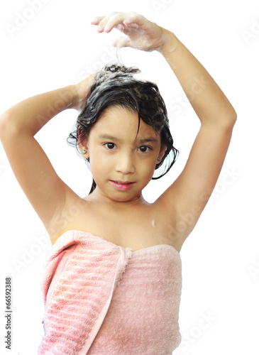 asian  girl shampooing her hair