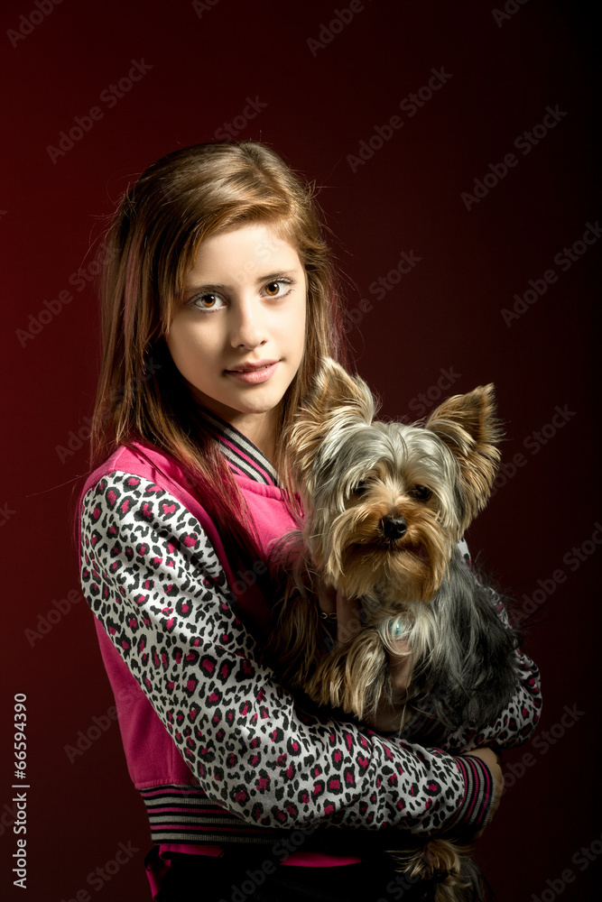 smiling young girl with her pet yorkshire smiling young girl with her pet yorkshire