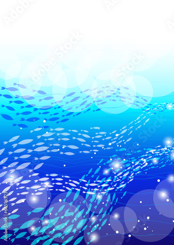 青い海と魚群の背景