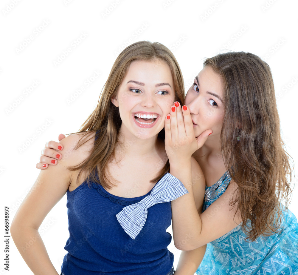 woman's secret, two young beautiful women friends whisper funny woman's secret, two young beautiful women friends whisper funny