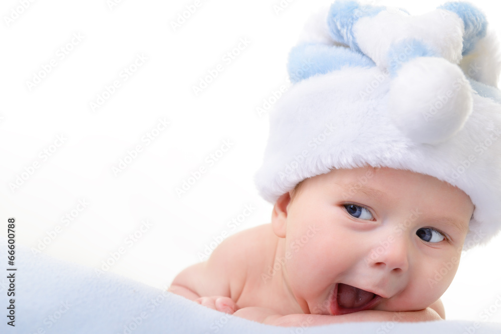christmas cute baby boy lying on blue soft plaid like on snowdri christmas cute baby boy lying on blue soft plaid like on snowdri