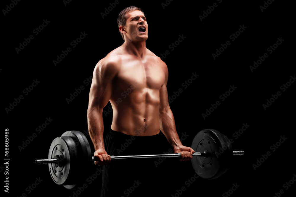 Bodybuilder exercising with a barbell Bodybuilder exercising with a barbell