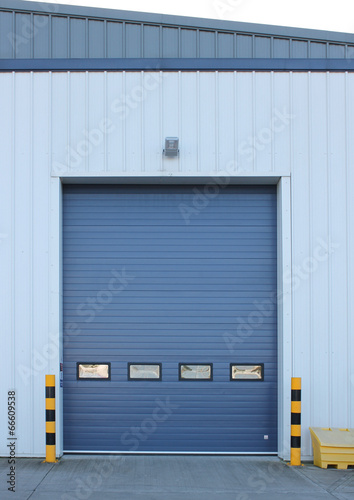 Factory loading bay roller door on industrial building