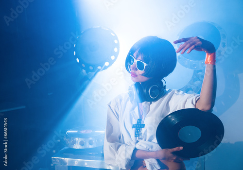 Girl DJ with vinyl records