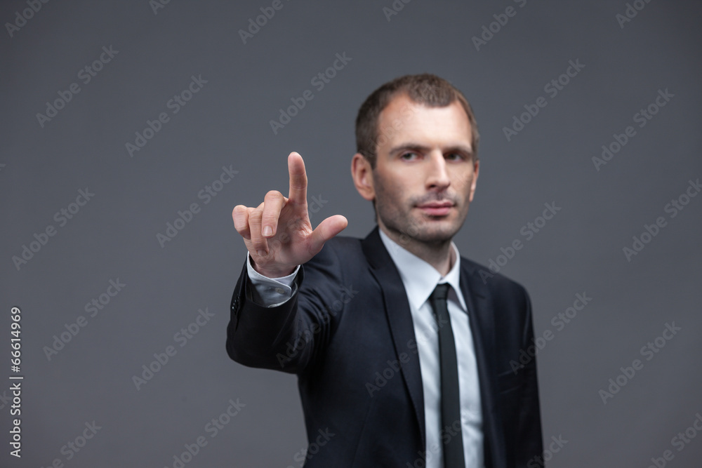 Portrait of business man pointing hand gestures, isolated Portrait of business man pointing hand gestures, isolated