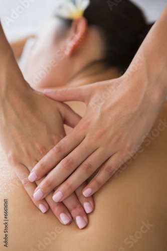 Brunette enjoying a back massage