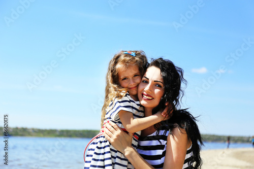 Happy mom and daughter on t...