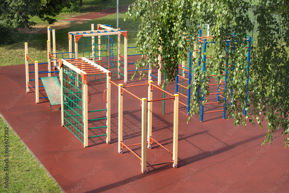 Fototapeta premium Children Playground outdoors in summer park after rain