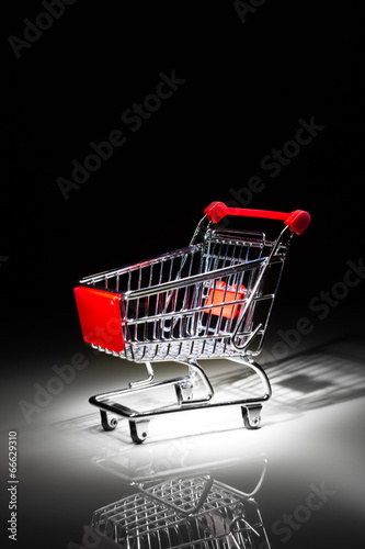 shopping cart on black background