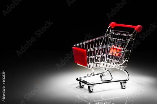shopping cart on black background