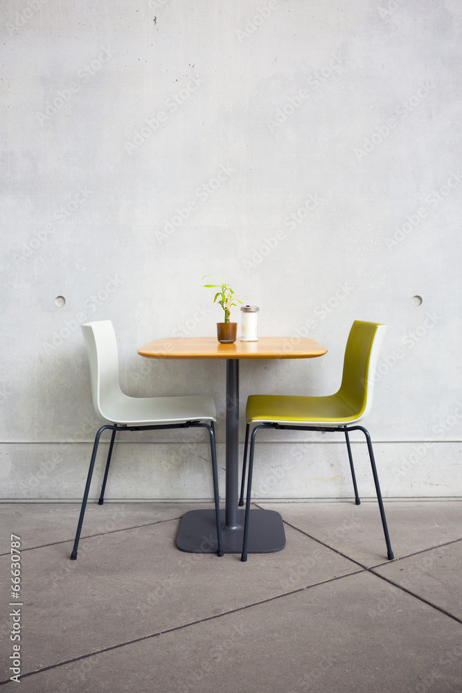 Fototapeta premium chairs and table at open-air cafe