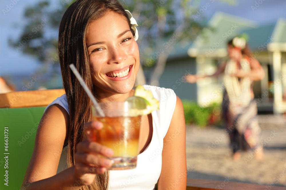 Woman drinking alcohol Mai Tai drink on Hawaii Woman drinking alcohol Mai Tai drink on Hawaii