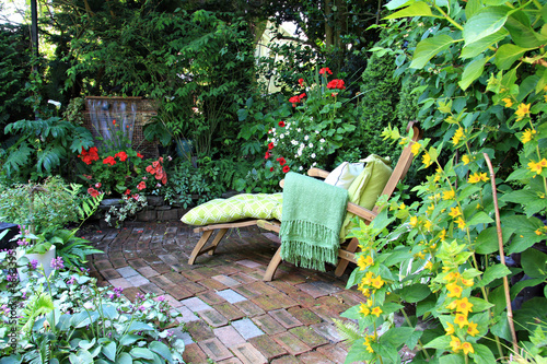 Fototapeta Naklejka Na Ścianę i Meble -  Garden lounge chair, also available in vertical.