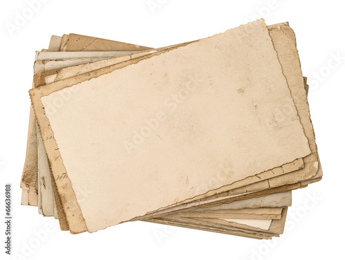 old postcards isolated on white. aged paper texture photo