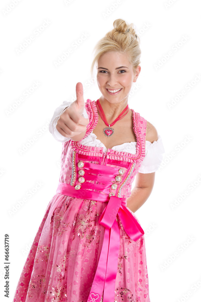 Lachende junge Frau im bayerischen Dirndl rosarot isoliert Lachende junge Frau im bayerischen Dirndl rosarot isoliert