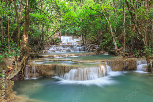 Tropical waterfall © Noppasinw