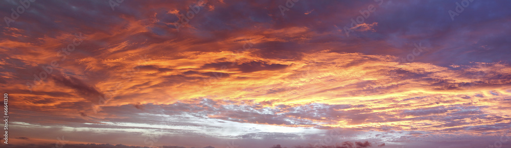 Bright sunset or sunrise clouds warm sky banner
