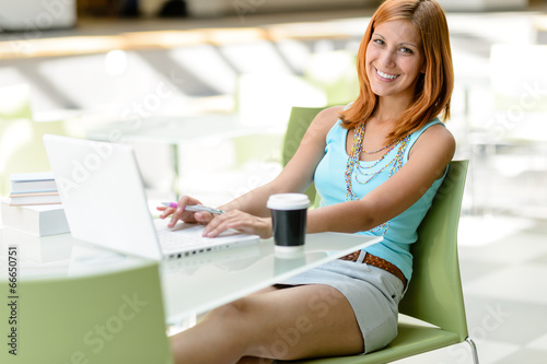 Free Download Student girl sitting in assembly hall smiling - GFXLoad