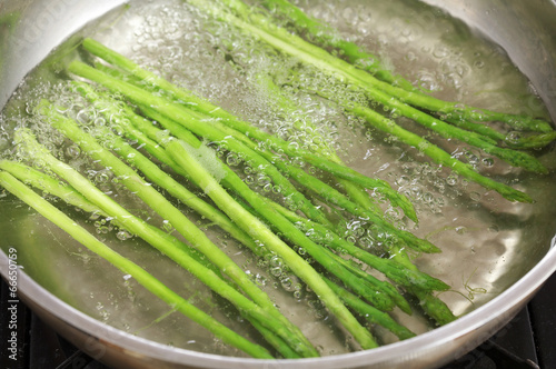 close up asparagus in pan